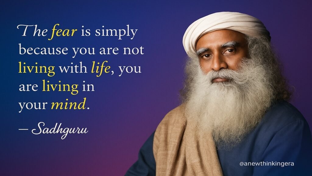 Sadhguru quote on fear, life, and the mind with a blue-purple background.